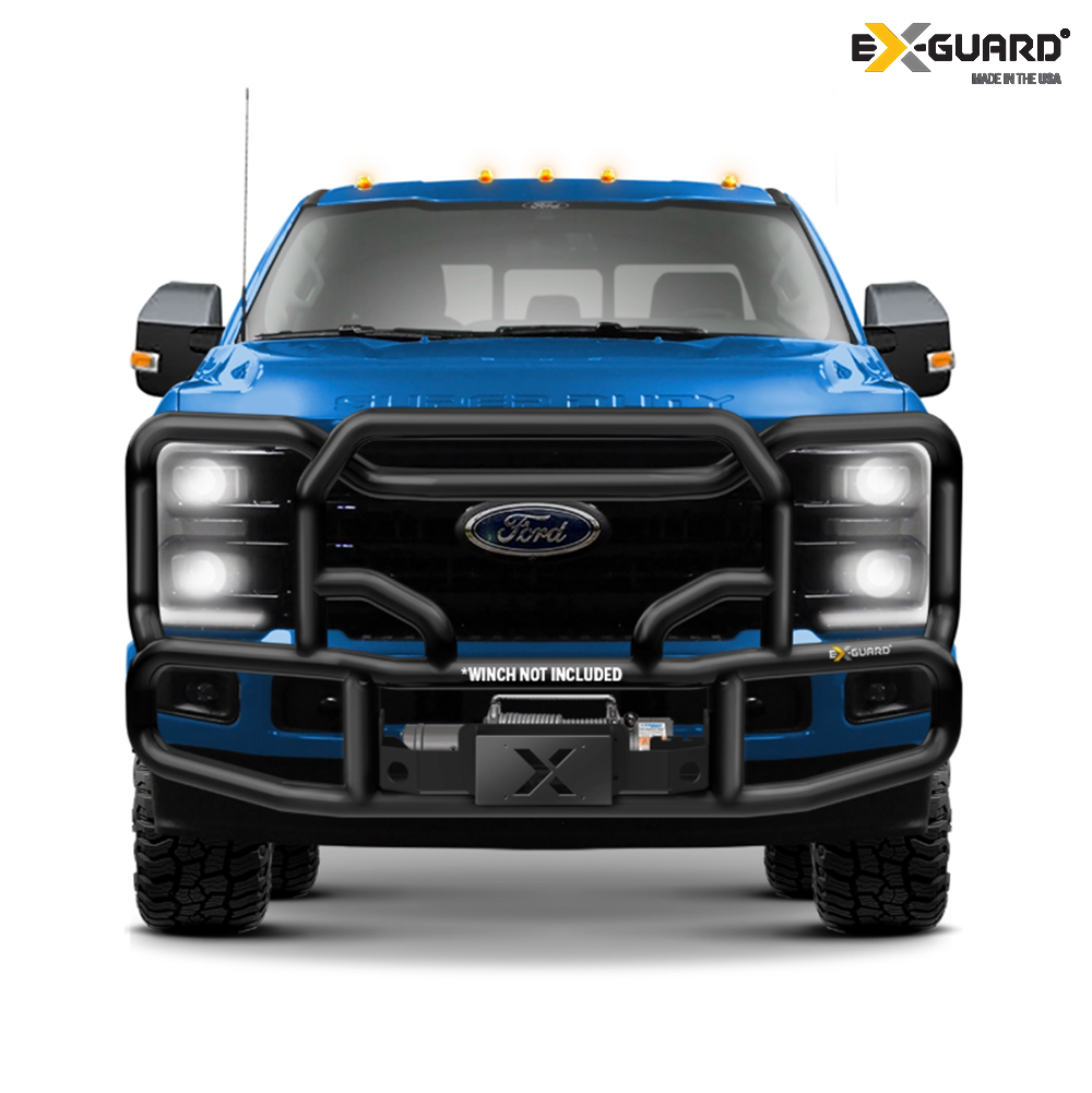 Blue Ford truck with black Ex-Guard grille guard bumper and 'Winch Not Included' label on a white background