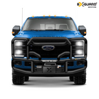 Blue Ford truck with black Ex-Guard grille guard bumper and 'Winch Not Included' label on a white background
